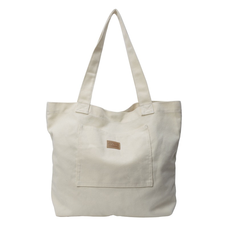 Bolso de lona para mujer 2024 nuevo bolso de hombro de gran capacidad de color sólido casual simple y versátil bolso de clase al por mayor
