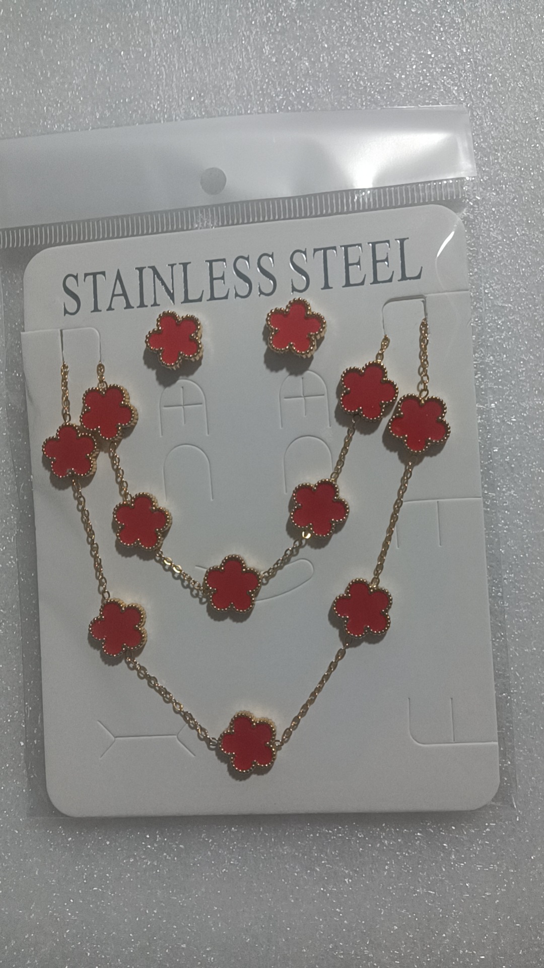 Trébol de cinco hojas de la suerte nuevo estilo transfronterizo pulsera de acero de titanio de doble cara, collar, aretes, moda de nicho de 18K, no se desvanece