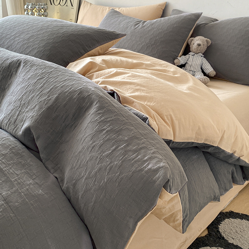 Un juego de cuatro piezas de cama de algodón 100 piezas de hilo de tres capas de algodón puro simple y ligero de lujo sábana cubierta de edredón juego de cama de tres piezas