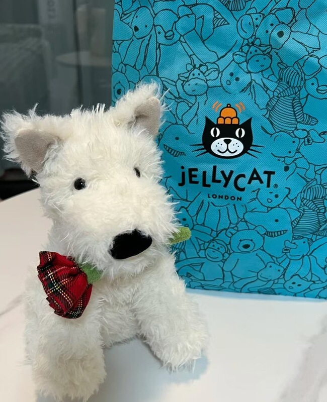 国産ジェリーキャットと同じスタイルの花を抱えたウェストハイランド・テリアのバレンタインデー用のかわいいぬいぐるみ、車の鍵のギフト|undefined