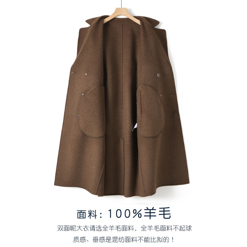 秋冬の長いタイプの膝の両面のカシミヤのコートの男性の双列は韓国版のスーツのゆったりしているウールのフードのコートを掛けます。