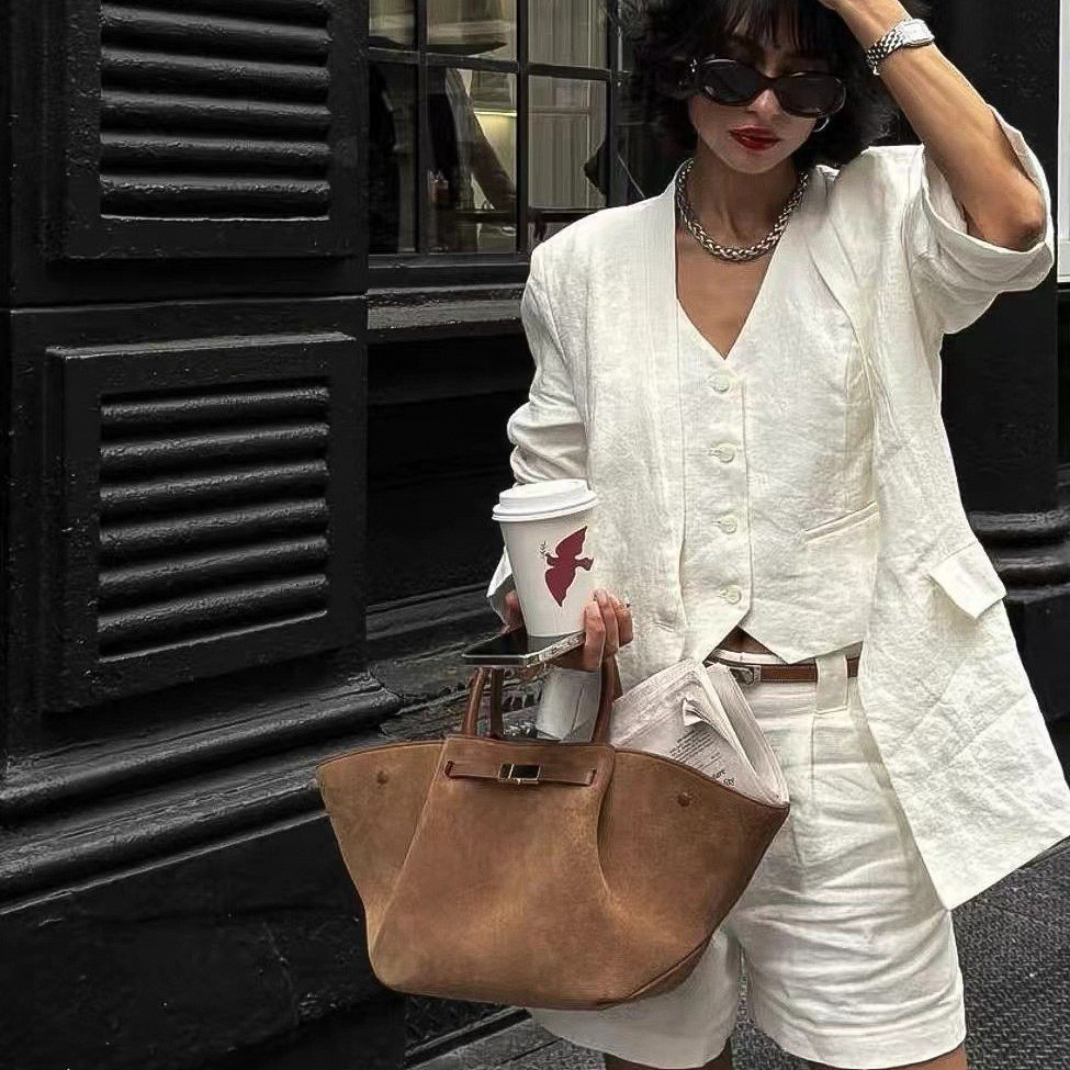 JW PEI Dumplings Bolso trapezoidal Pasaje de alta calidad Bolso de gamuza retro de gran capacidad Bolso de un solo hombro