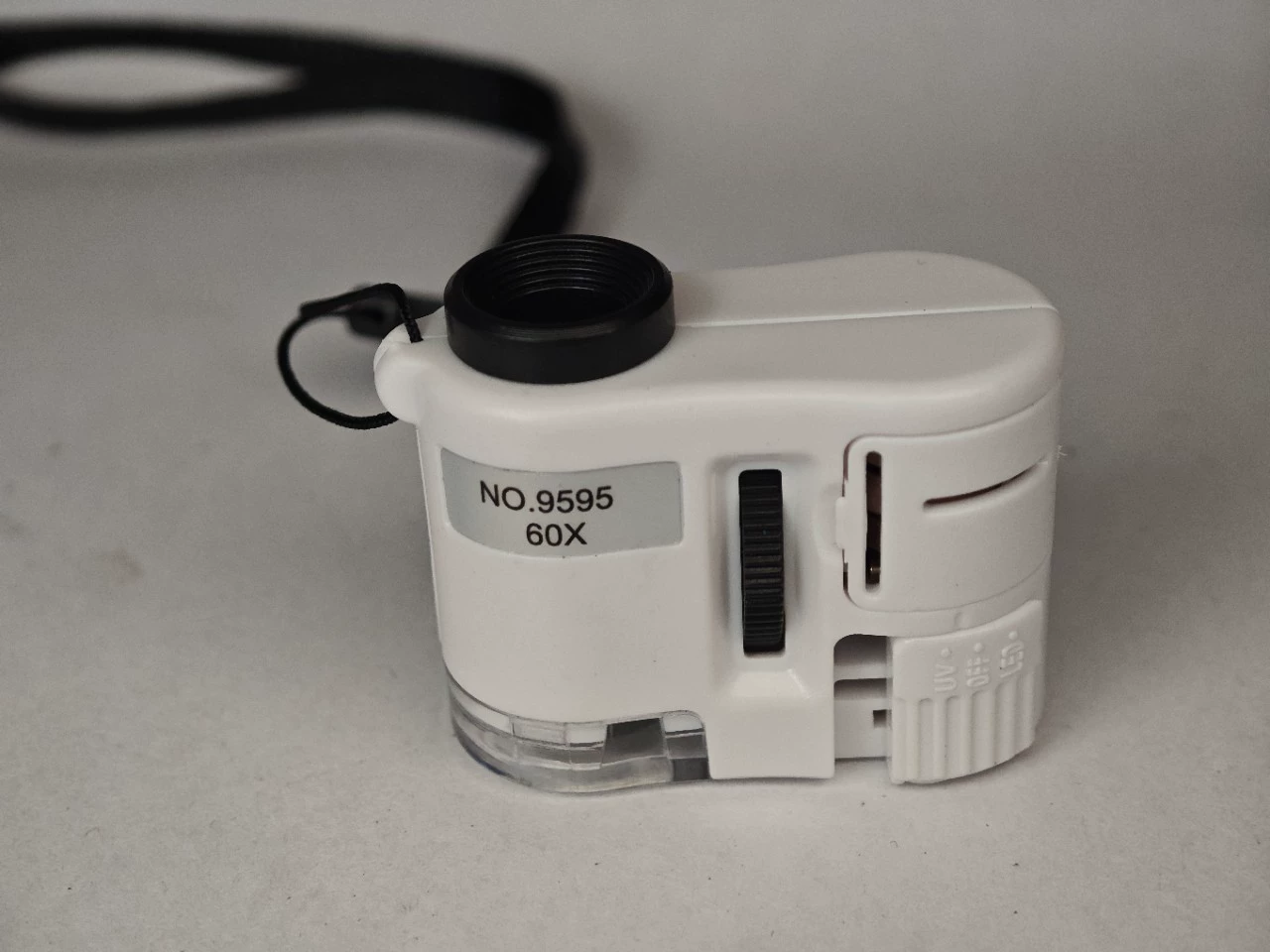 Микроскоп 9595 белый, 60x, миниатюрный, для оценки ювелирных изделий, со светодиодной подсветкой, УФ-подсветкой для проверки валюты, портативный светодиодный фонарь, поляризованный свет для проверки валюты