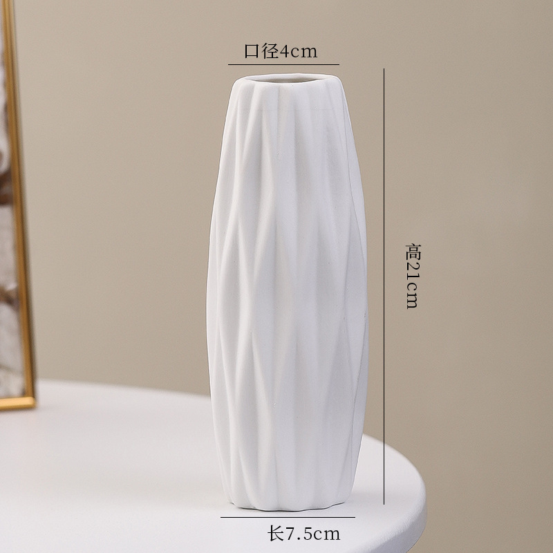 シンプルな現代の満天星陶磁器の花瓶の置物の客間の白い磁器の小さい清新な乾いた花の生け花の創意の陶磁器の花器|undefined