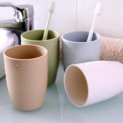 シンプルでファッション的なカップルのうがいのコップの無地のうがいの歯ブラシのコップのセットの円形の歯ブラシのコップのメーカーの卸売り