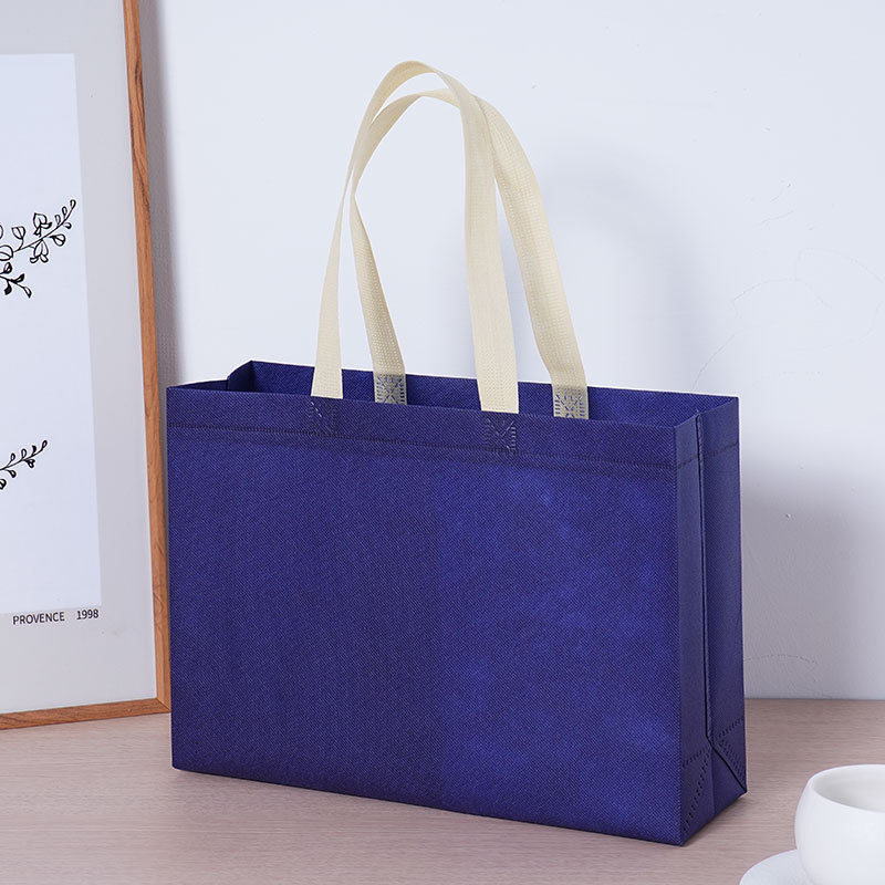 Bolsas de tela no tejida personalizadas impresión de logotipo tienda de ropa bolsa de mano ecológica bolsa de compras no tejida bolsa de regalo personalizada