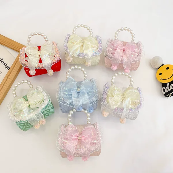 Children's Pearl handbag 2022 new personality children's bow crossbody bag fashion Princess cotton and linen coin purse