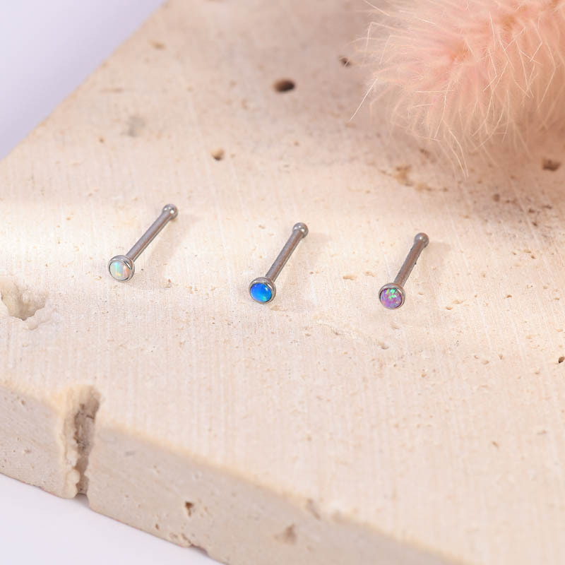 Silver pointed spike labret stud material detail