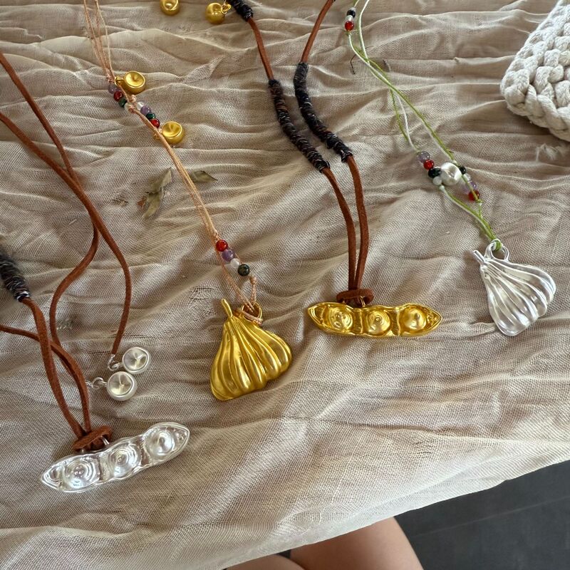 Textured Pumpkin Braided Rope Necklace Original Niche Designer Retro Peanut Sweater Chain Fresh and Sweet Necklace Necklace Textured Pumpkin Braided Rope Necklace Original Niche Designer Retro Peanut Sweater Chain Fresh and Sweet Necklace Necklace