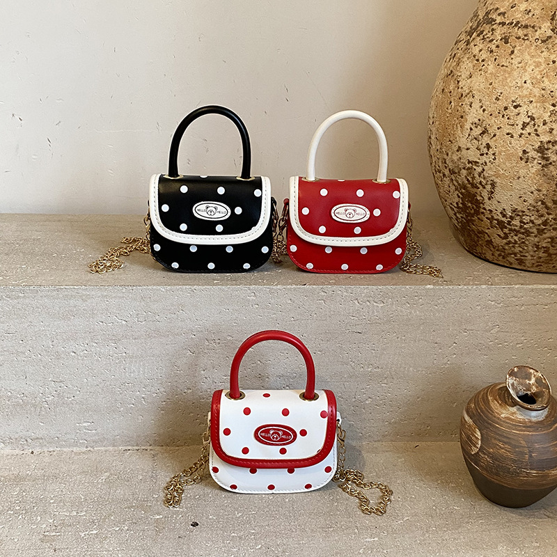 Dulce corazón de una niña pequeña princesa bolso de hombro de ondas de aire extranjero punto mini bolso de bebé bolso de hombro adorable oso pequeño bolso de niños