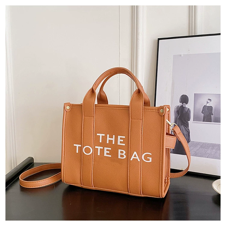 Handheld capacious purse, shoulder bag, one-shoulder bag, city style