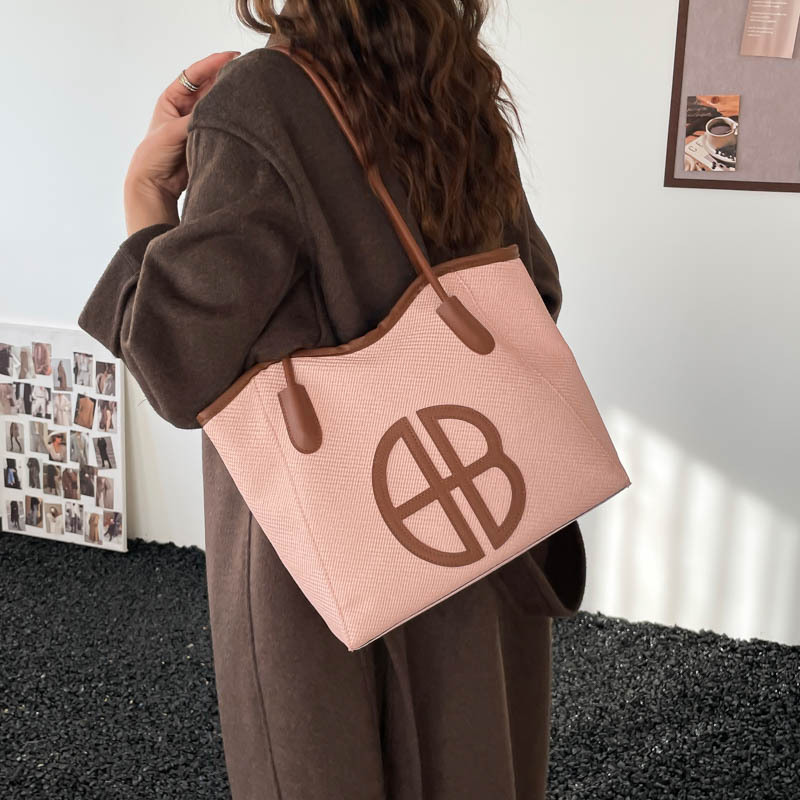 Bolsa de brazo de gran capacidad para viajar 2026 nueva moda bolso de mujer de alto nivel nicho bolso de hombro bolso especial para mujeres