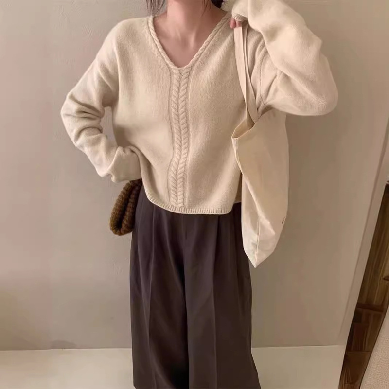 韓国系の怠惰な風の柔らかいモチモチとした質感の麻花のセーターの女性の秋冬の新型のデザイン感のゆったりしたニットの上着|undefined