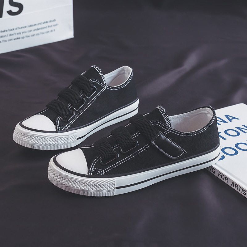Zapatos de lona bajos de estilo coreano para mujer 2024 Primavera Nueva hebilla zapatos blancos mocasines para estudiantes zapatos de goma vulcanizada zapatos de tela