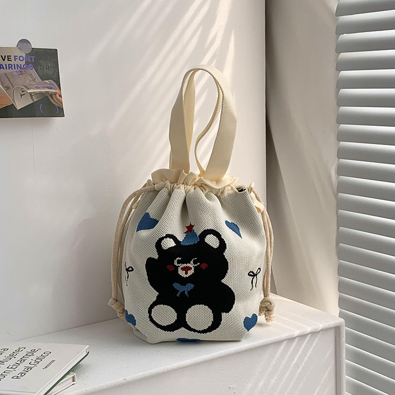 Bolsa de cinturón versátil nuevo patrón de dibujos animados nicho lindo bolso de arroz de almuerzo de cuerda bolso de cubo de mano bolso de brazo