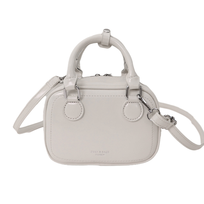 Bolsa de bolos portátil de alto nivel para mujeres 2026 nueva moda coreana lujosa y ligera bolsa de hombro