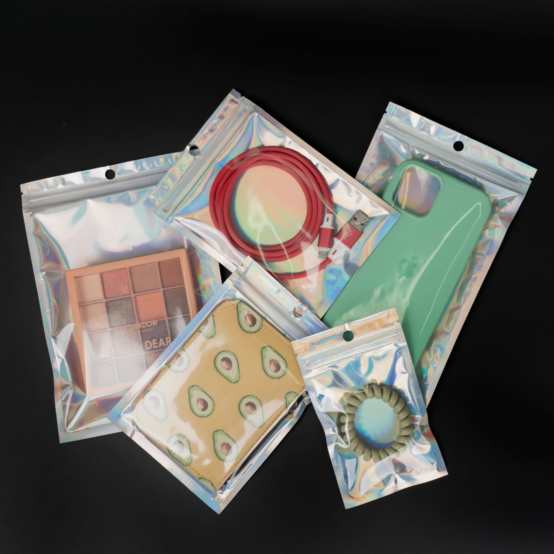 Bolsa láser Yin-Yang Bolsa autosellante Joyería Cosméticos Bolsa sellada transparente de plástico Cable de datos Joyería Bolsa de embalaje al por mayor