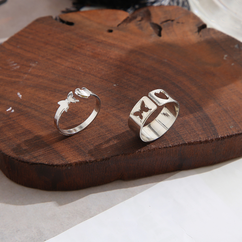 fashion geometric hollowed heart butterfly shaped alloy rings two piece set wholesale