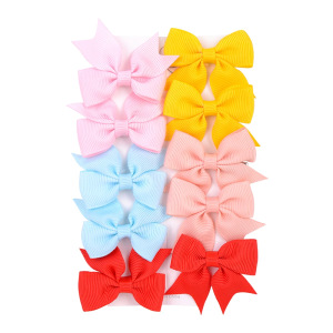 Juego de horquillas con lazo de cola de milano para niños de estilo caliente de Amazon, lindo y versátil, horquilla diaria para niñas europeas y americanas 323