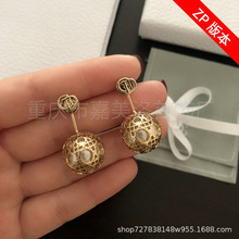 廠家銷售21新款迪家黃銅鏤空金屬球體內嵌珍珠復古歐美風耳環