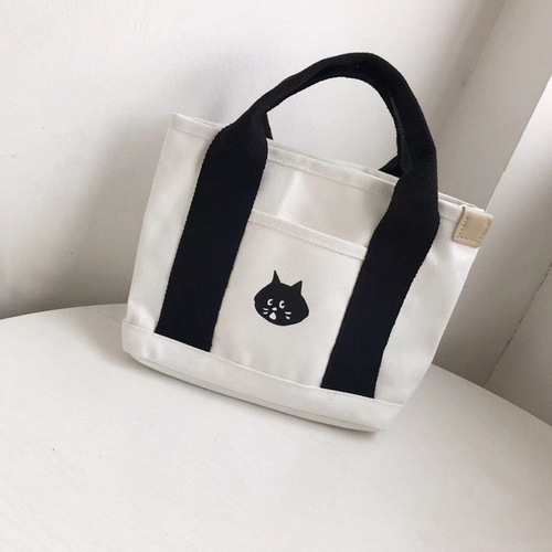 Japanese surprised cat cartoon cute canvas handbag casual versatile hand storage bag student lunch bag