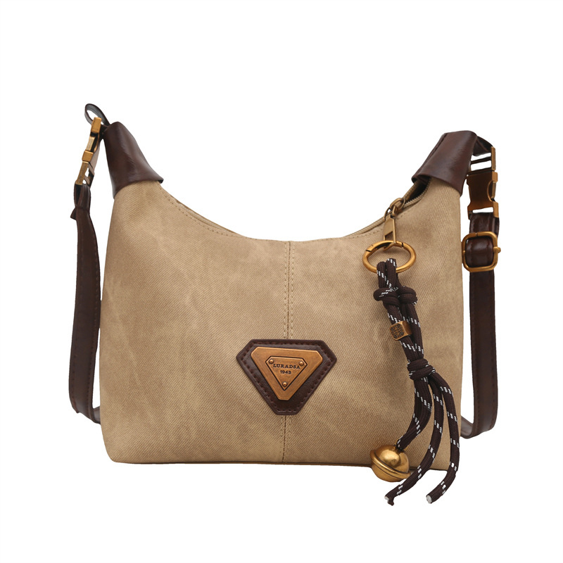 2025 nueva sensación de retro bolsos de mujer moda moda textura bolsos de hombro coreanos populares mochila de viaje