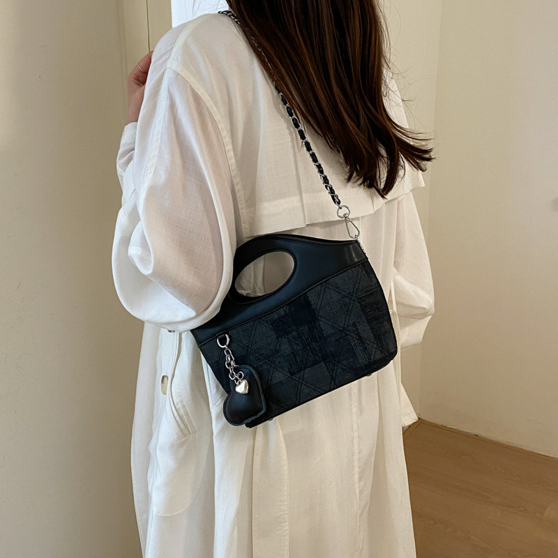 Bolsa de cadena de diamante diaria bolsa de cuero suave de mujer 2026 nuevo verano relajado bolsa de hombro inclinada para viajar
