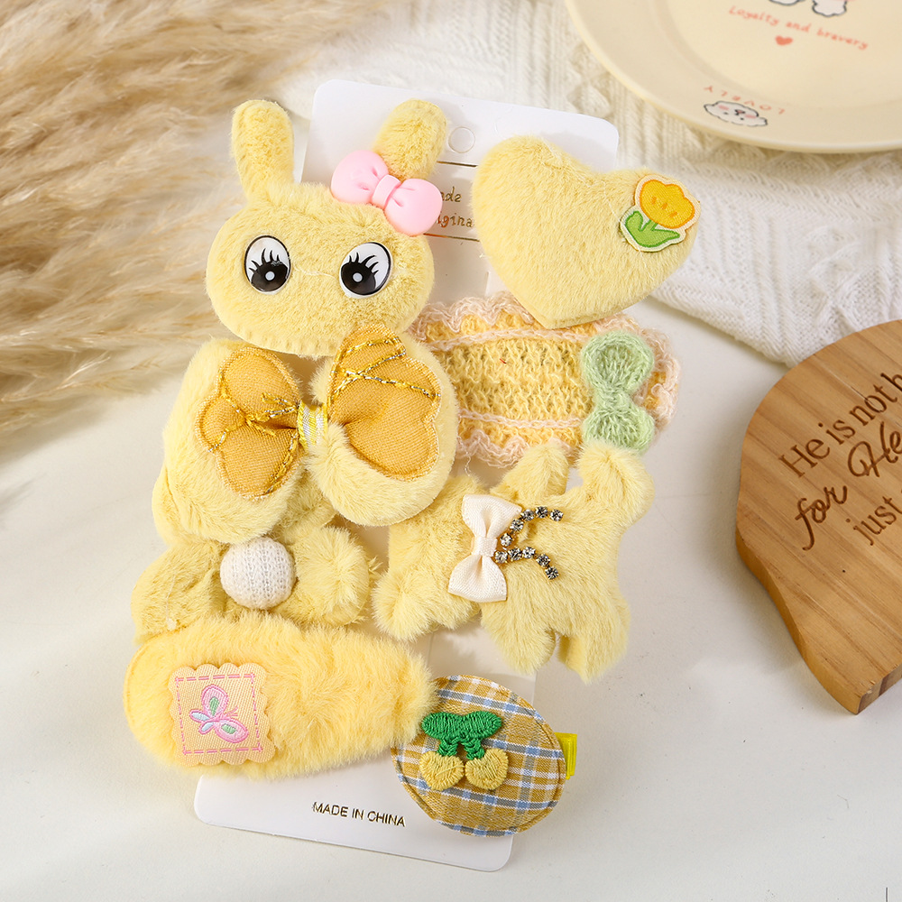 Otoño y invierno dibujos animados adorables clips para el cabello para niños dulce viento arco conejo conjunto de ocho piezas frangeas rotas clips para el cabello