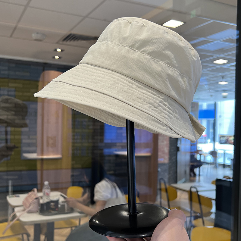 Sombrero de pescador de protección solar para mujeres 2024 nuevo estilo de estilo de moda con bordes anchos y una parte superior plana, sombrero de sol casual universal