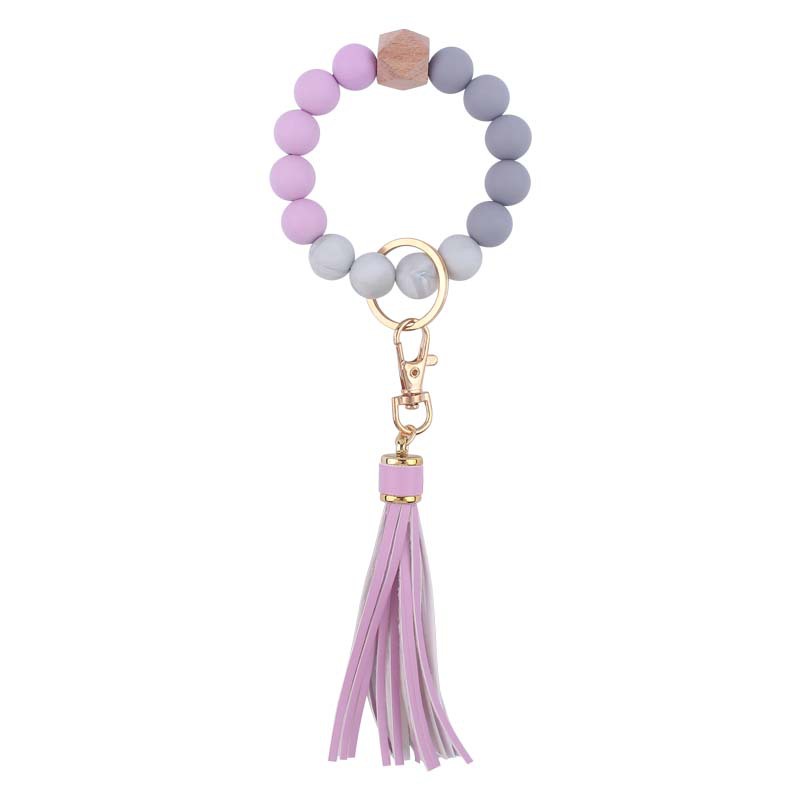 Creativo nuevo cuero pu borla colgante llavero silicona muñeca leopardo silicona pulsera llavero