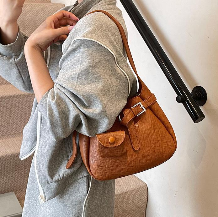 Bolso de cubo de aire extranjero de tendencia transfronteriza para mujer 2025 nuevo bolso de mensajero de viaje casual bolso de hombro de axila de moda de todo fósforo