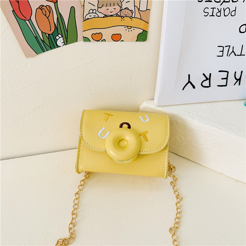 2025 otoño nuevo bolso de moda para niños color caramelo PU bolso de hombro para niñas bolso de cadena de hombro bolso de accesorios para bebés