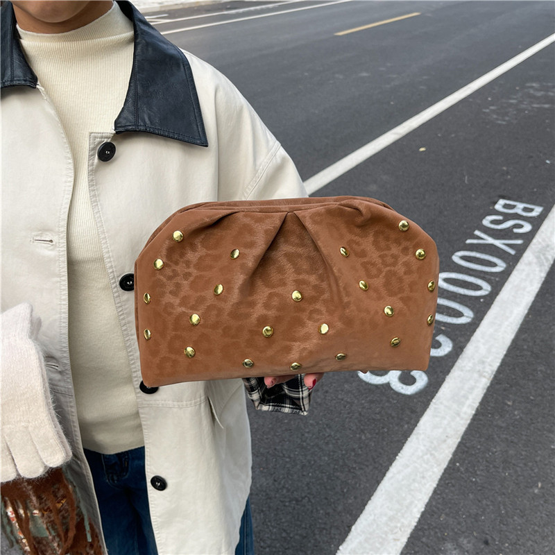 Plegado de tendencia punto de onda de otoño invierno bolso de mano femenino bolso de cena de alta calidad ocio