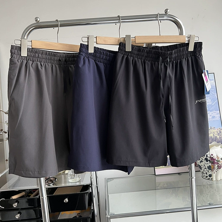 K европейские и американские заказы для внешней торговли Чистый юань летом для мужчин тонкий и дышащий четыре стороны эластичные спортивные фитнес быстрохненькие шорты