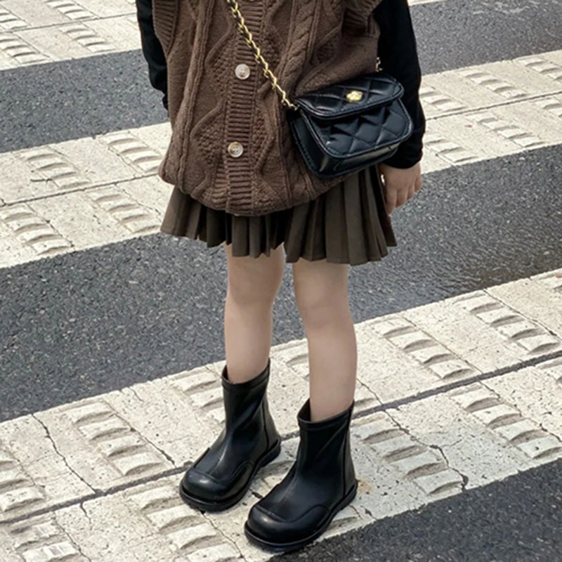 Niñas suéter chaleco 2023 nueva primavera y otoño retro color sólido giro tejido cardigan casual de los niños Falda plisada