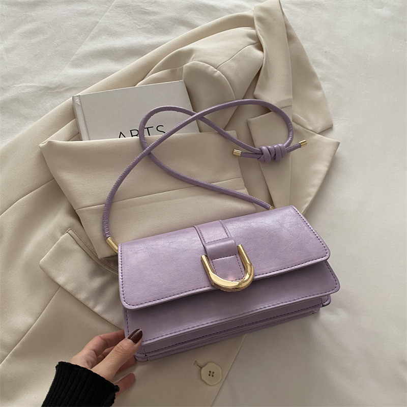 Diseño francés de nicho retro bolso debajo de la axila para mujeres 2024 otoño y invierno nuevo paquete de mano de hombro de alta calidad