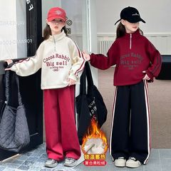 ネットの赤い女の子の韓国版の運動のスーツの中で大きい子供の秋冬の新型の洋気のアルファベットのガードルの流行のズボンの2つのセット