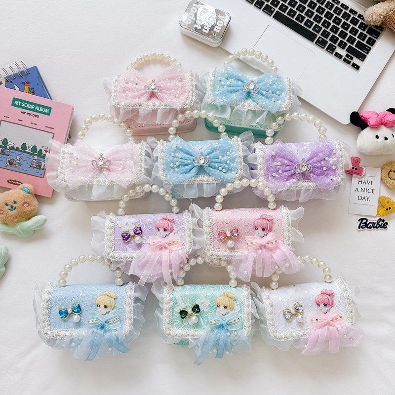 Bolso para niños 2025 nuevo lindos bolso de niña bolso accesorios de princesa de estilo extranjero bolso de cadena de perlas de fragancia
