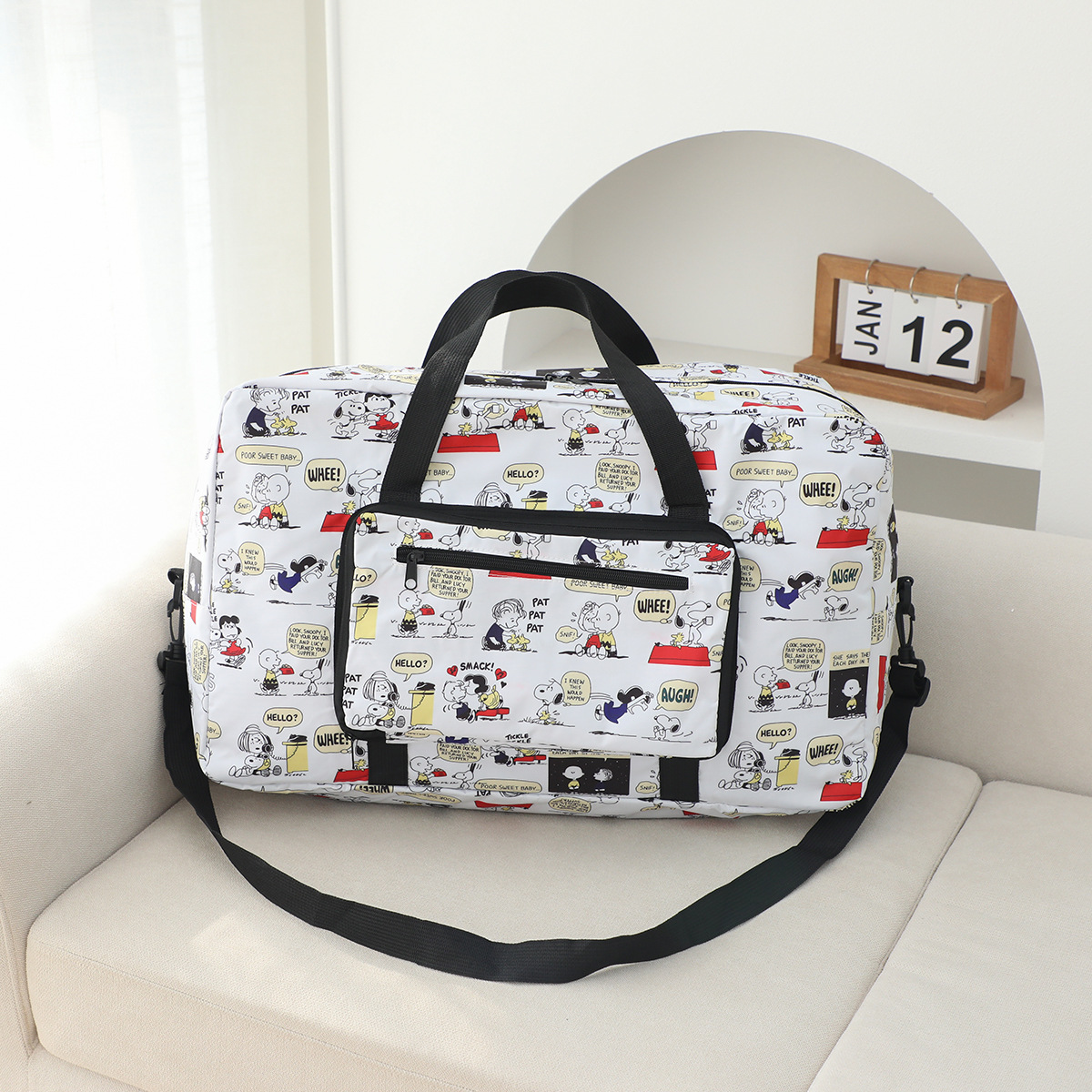 虹熊クロミ大容量手提げ旅行袋は旅行箱のポールに挿してもいいです。