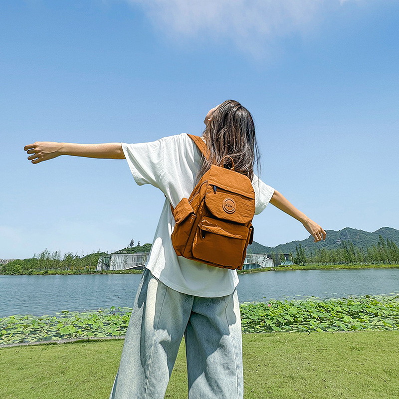 Casual, ligero y de gran capacidad, mochila para niños y niñas, mochila simple de color sólido para estudiantes de primaria, nueva mochila infantil transfronteriza