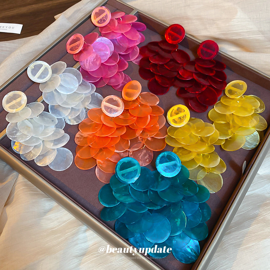 Pendientes de borla de concha de color de aguja de plata Pendientes de estilo de vacaciones de playa para mujer Pendientes de todo fósforo de alta gama Sentido de diseño nicho