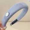 Light blue round mark