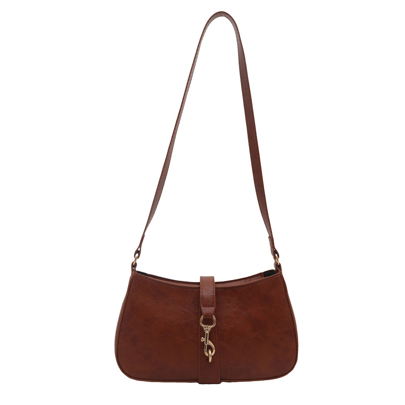 Bolsa de brazo francesa nicho para mujeres 2025 primavera y verano nueva moda moda personalidad bolso de palo estilo coreano bolso de hombro retro