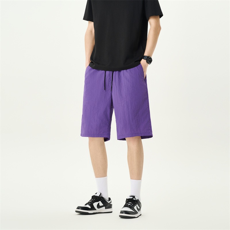 Camisas y menos ropa pantalones cortos casuales de verano seda de hielo para hombres, transpirable y de secado rápido, pantalones de cinco puntos sueltos para correr en deportes callejeros fritos