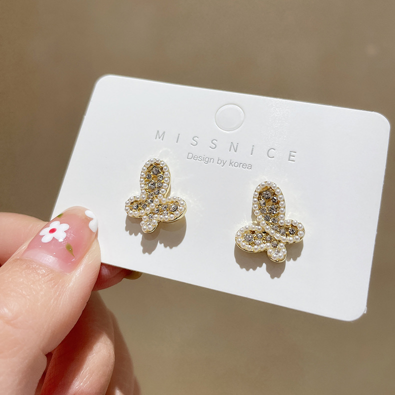 Boucles D&#39;oreilles Papillon En Perles De Mode En Gros display picture 1