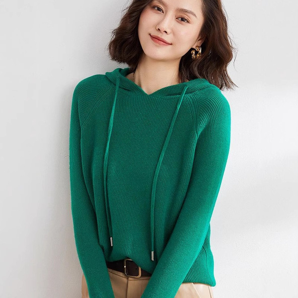 Knitted sweater with hood