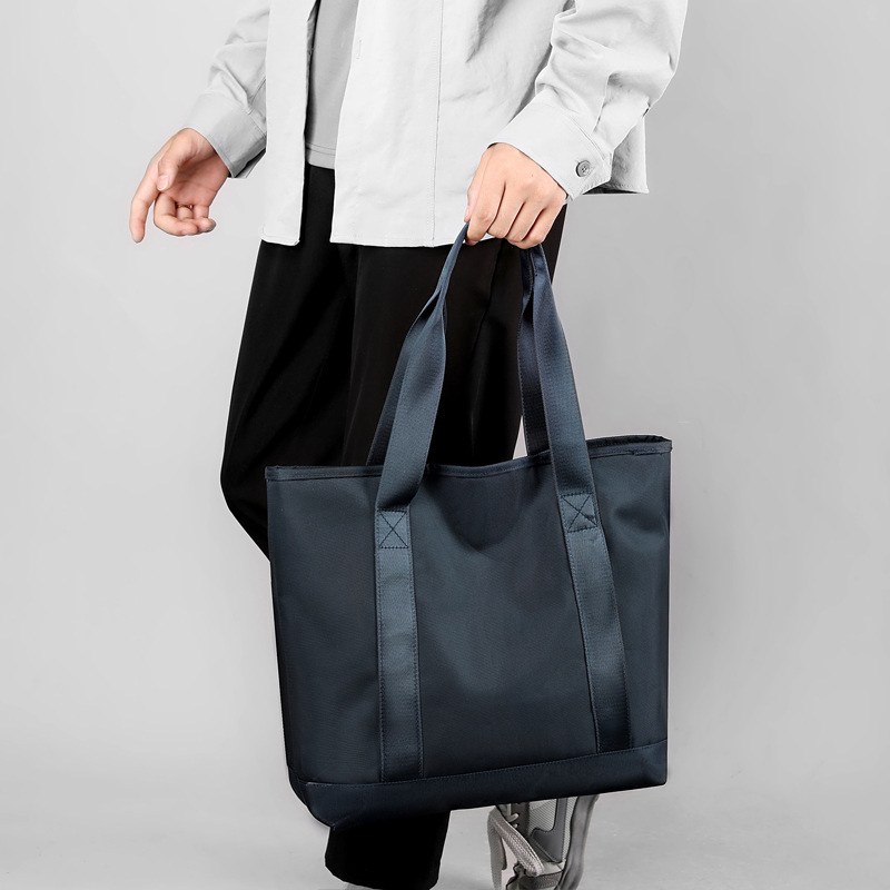 Cremallera casual bolsa de tela de nylon para mujer 2023 nueva bolsa de hombro impermeable de gran capacidad portátil simple Otoño e Invierno bolsa