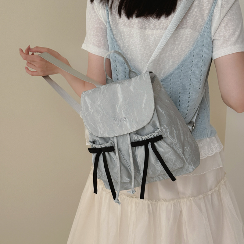 Bolsa de hombro de arco de mujer verano 2026 nueva moda coreana nicho popular mochila de hombro de gran capacidad