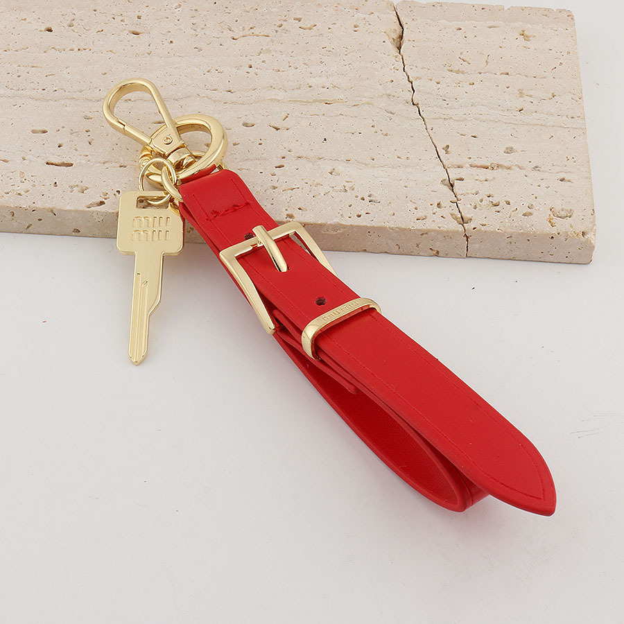 Xiaohongshu ins estilo explosivo uim caja de llaves de cuero colgante llavero de coche colgante pequeño de moda para hombres y mujeres