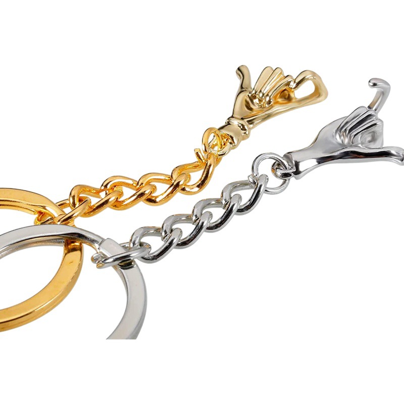 Transfronterizo nuevo Amazon venta caliente pareja mano a mano llavero creativo personalidad hombres y mujeres moda día de San Valentín colgante